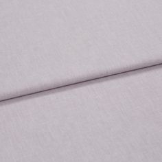 A folded piece of fabric with Harper Orchid Petal Purple printed on it