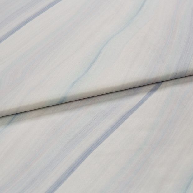 A folded piece of fabric with Elegance Mist Blue printed on it