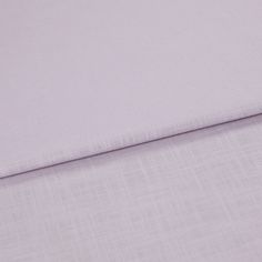 A folded piece of fabric with Faso Lavender Purple printed on it