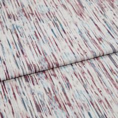 A folded piece of fabric with Florent Fuchsia Pink printed on it