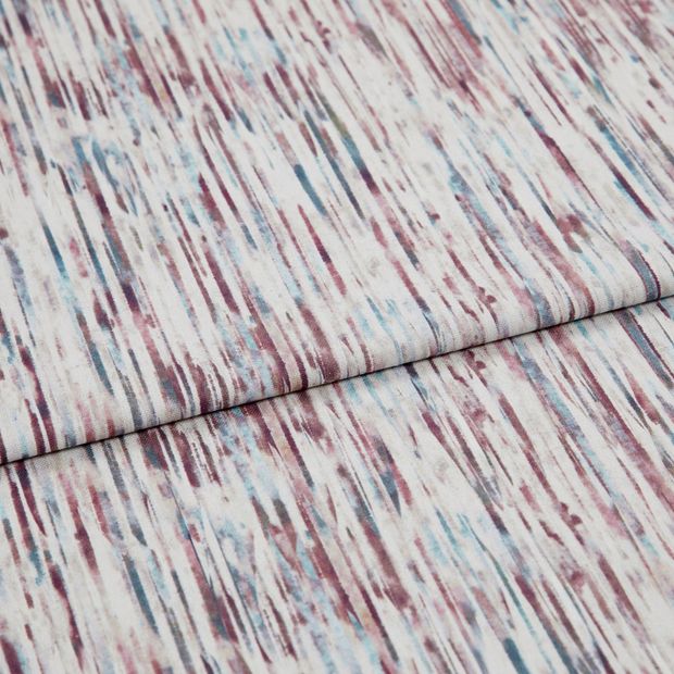 A folded piece of fabric with Florent Fuchsia Pink printed on it