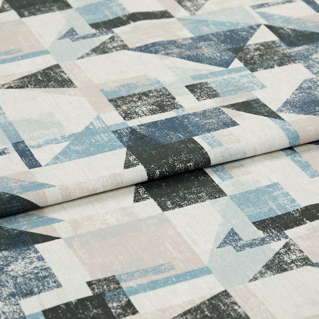 A folded piece of fabric with Fraction Blue printed on it