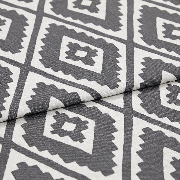 A folded piece of fabric with Mali Peat Black printed on it
