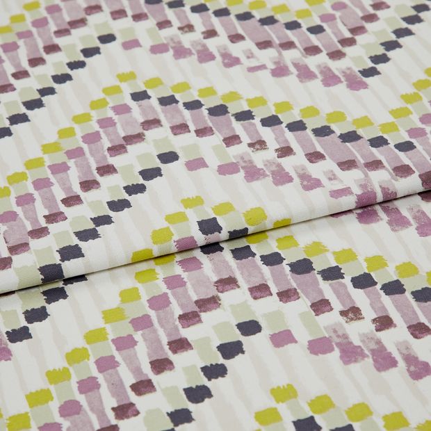 A folded piece of fabric with Holi Orchid Purple printed on it