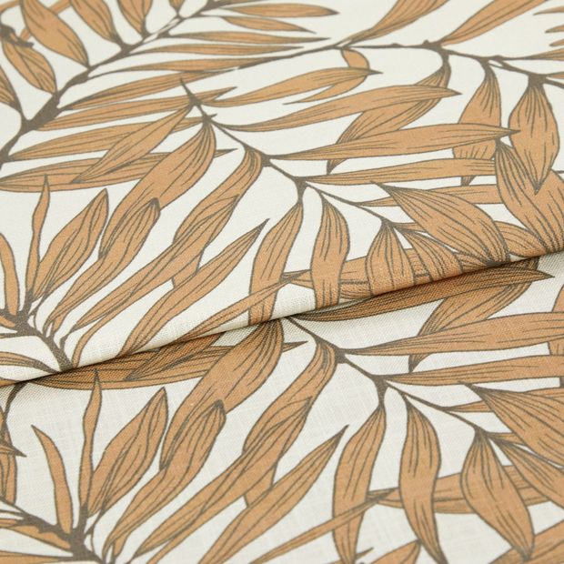 A folded piece of fabric with Laurel Rust Orange printed on it