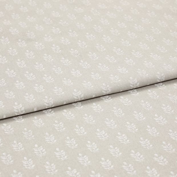 A folded piece of fabric with Layla Stone Cream printed on it