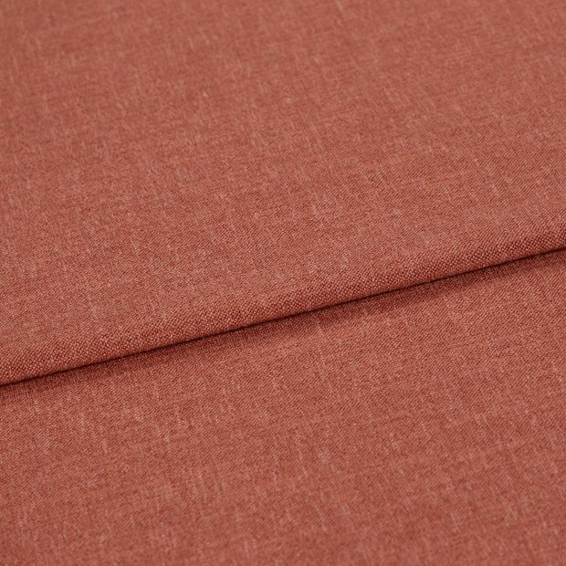 A folded piece of fabric with Lindora Sienna Orange printed on it
