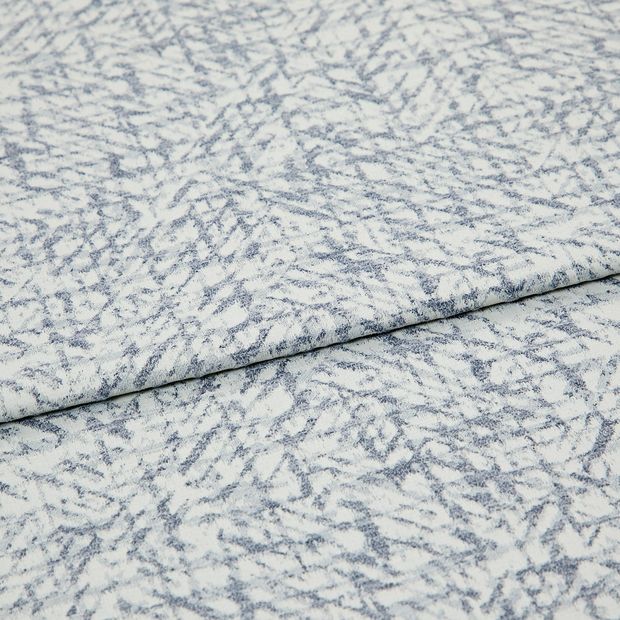 A folded piece of fabric with Morse Blue printed on it
