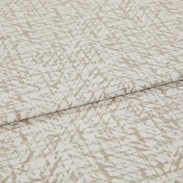 A folded piece of fabric with Morse Natural Cream printed on it