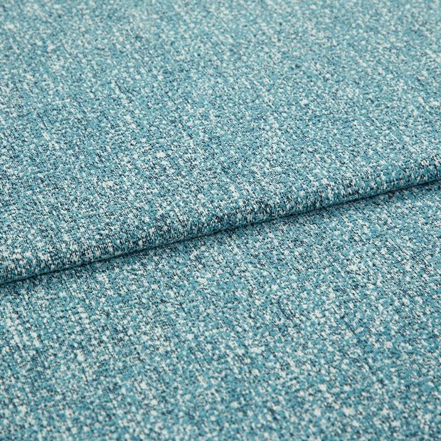 A folded piece of fabric with Paloma Aqua Teal printed on it