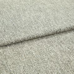 A folded piece of fabric with Paloma Tan Cream printed on it