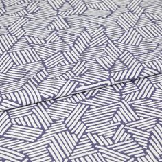 A folded piece of fabric with Parquet Blue printed on it