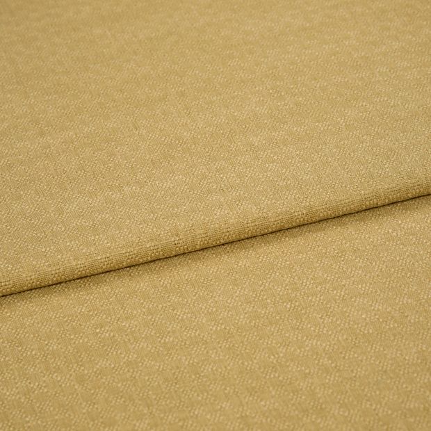 A folded piece of fabric with Pearl Wheat Gold printed on it