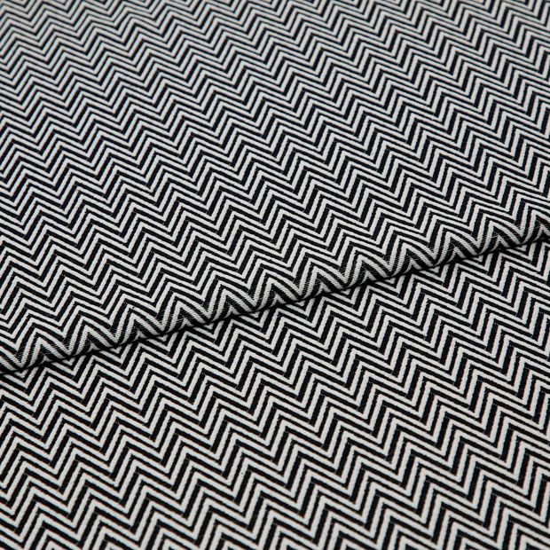 A folded piece of fabric with Pippa Jet Grey printed on it