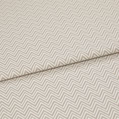 A folded piece of fabric with Pippa Natural Cream printed on it