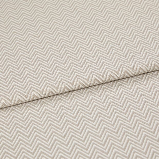 A folded piece of fabric with Pippa Natural Cream printed on it
