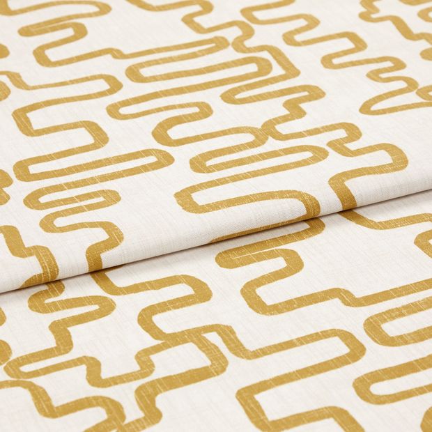 A folded piece of fabric with Wirl Chartreuse Yellow printed on it