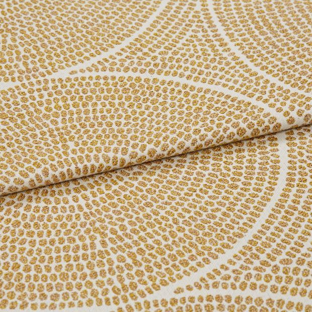A folded piece of fabric with Zane Sand Dune Gold printed on it