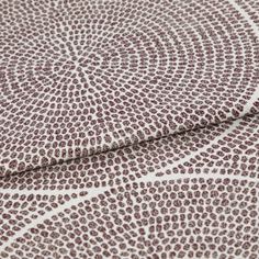 A folded piece of fabric with Zane Wineberry Purple printed on it