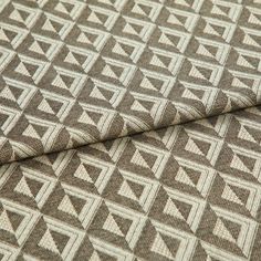 A folded piece of fabric with Zircon Phantom Monochrome printed on it