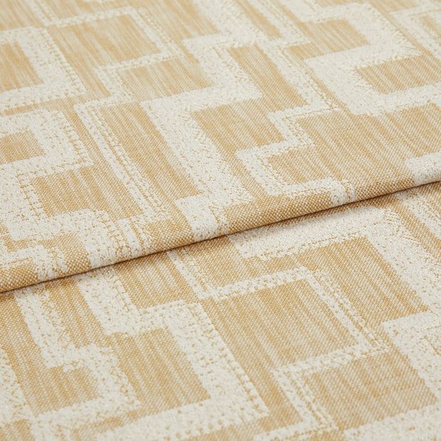 A folded piece of fabric with Power Honey Gold printed on it