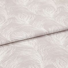 A folded piece of fabric with Quill Hush Pink printed on it