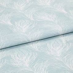 A folded piece of fabric with Quill Mist Blue printed on it