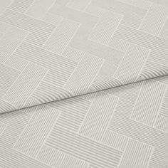 A folded piece of fabric with Rebel Mushroom Cream printed on it