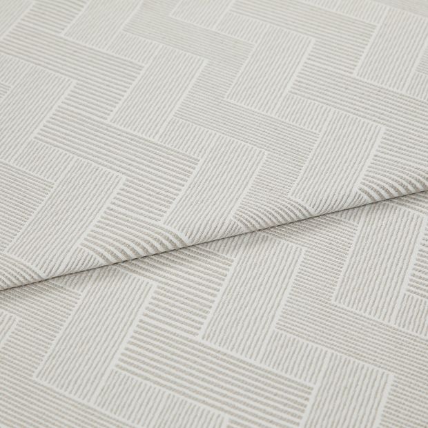A folded piece of fabric with Rebel Mushroom Cream printed on it