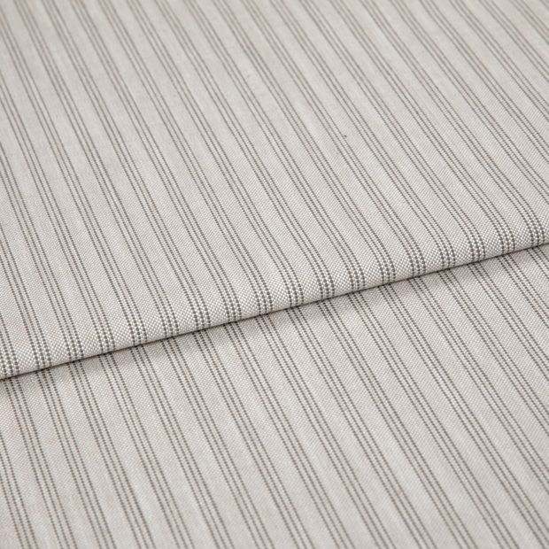 A folded piece of fabric with Shelby Charcoal Grey printed on it