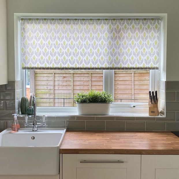 Petula ochre patterned roller blind in kitchen window