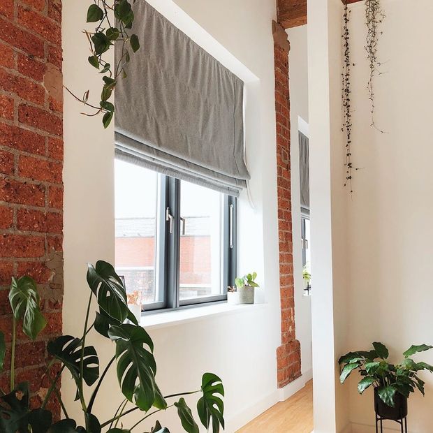 Huxley charcoal roman blind in living room