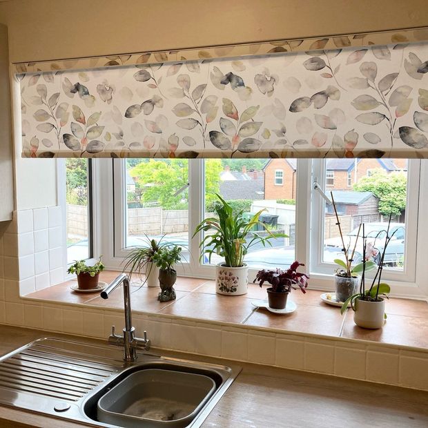 Matilda oyster roller blind half closed on kitchen window