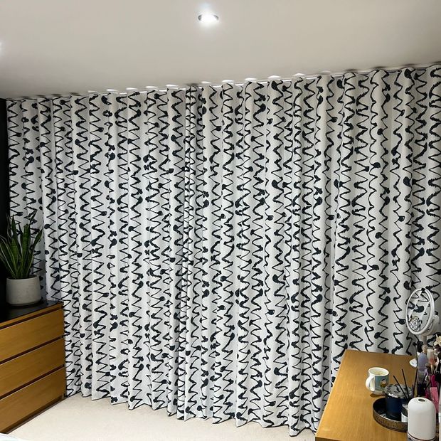 Wolfe smoulder full length curtains in bedroom