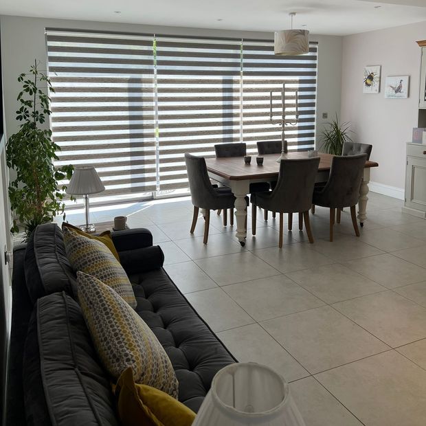 Nightfall Pewter Grey day and night blinds in dining/living room