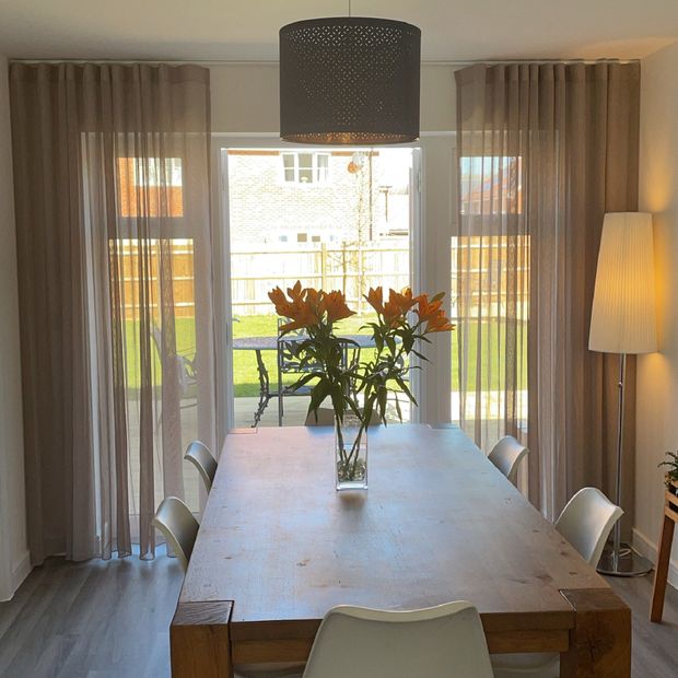 Serenity Mauve voile curtain in dining room