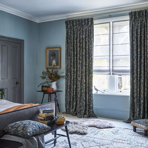 Anika Grey floor length pinch pleat curtains paired with voile roman blinds in bedroom