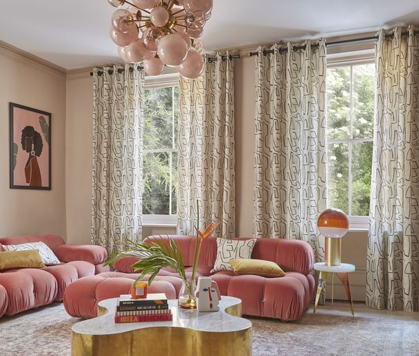 Nora putty floor length eyelet curtains in cosy pink themed living room