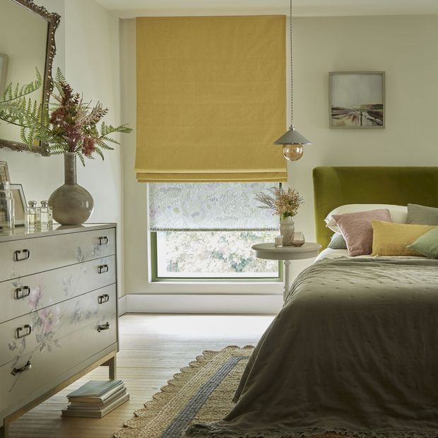 Harper sunshine roman blinds paired with daisy spring roller blinds in pastel themed bedroom