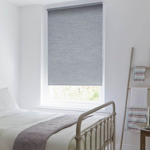 Grey hayden dove roller blind in white bedroom