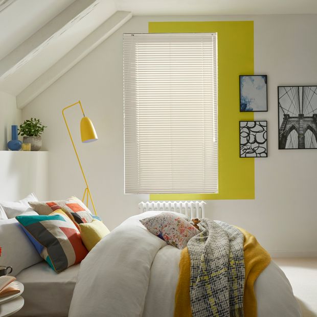 Spectrum off white metal venetian blinds in bright bedroom