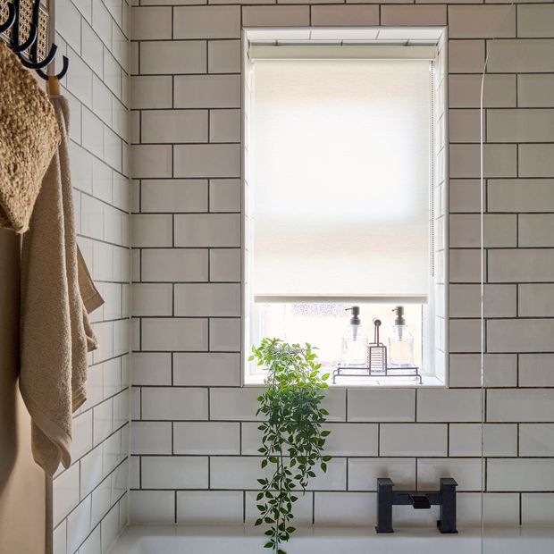 Marco whitewash cream roller blind in small bathroom window