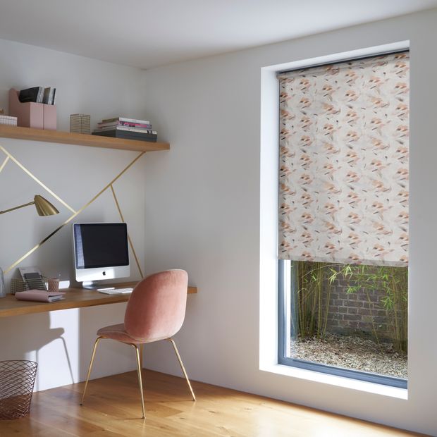 Rivara plaster floral patterned roller blind on long window in study room