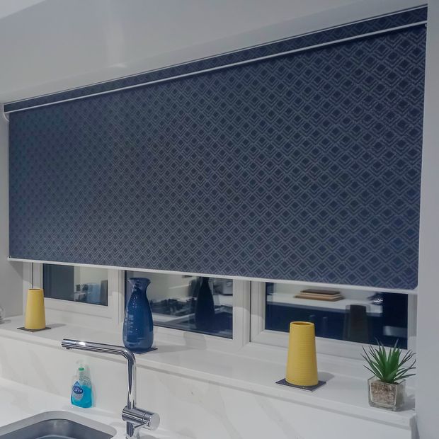 milan ink blue/black roller blind above kitchen sink
