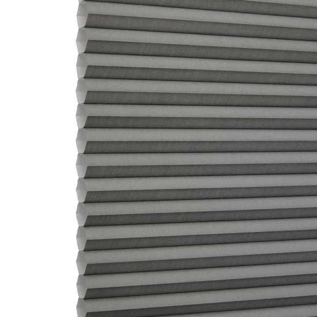 Silk Charcoal Duette swatch is a dark, smoky grey colour- image has an angle view, showing the side of the pleated blind
