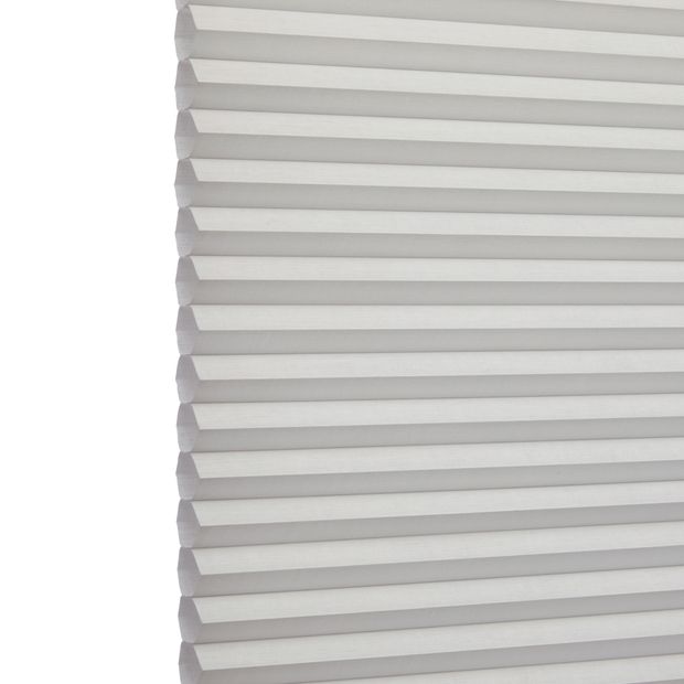 Silk Dolphin Duette swatch is a pale-aqua grey shade- image has an angle view, showing the side of the pleated blind