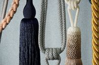 Array of curtain hold backs