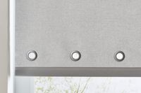 grey roller blind with eyelets in hem
