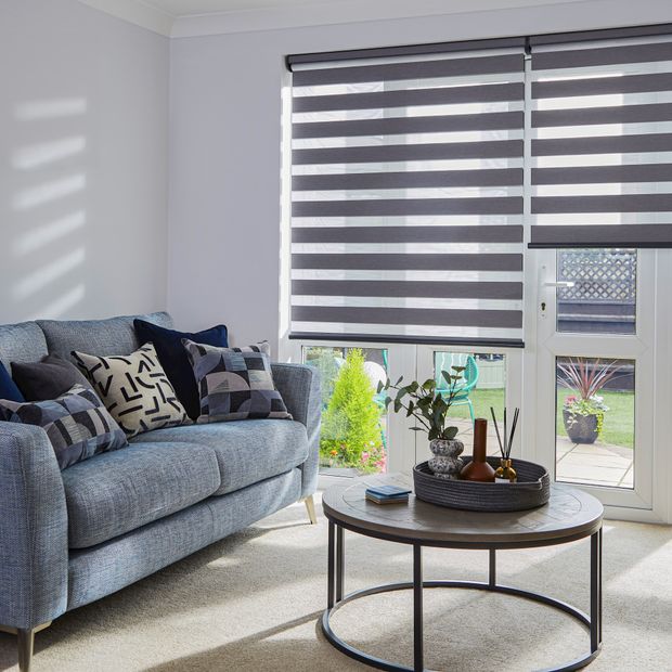 pewter grey day and night blinds on french doors in living room