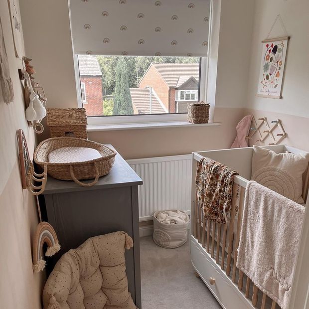 summer sky rainbow patterned roller blind on window in neutral scandi inspired childs bedroom